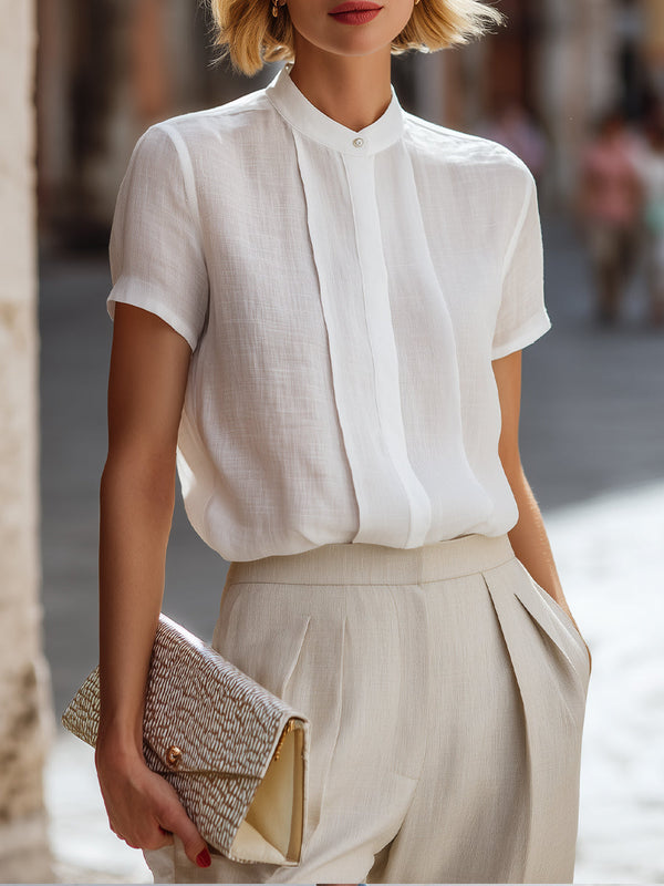 Structured Short Sleeve Stand Collar Blouse With Pleated Front Panel 1